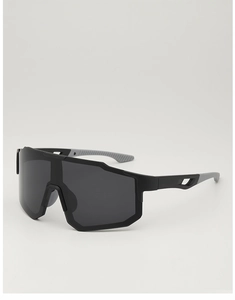 Detail of matte black cycling sunglasses with gray non-slip temples and large lens