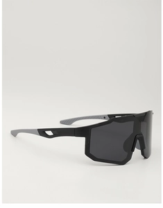 Close-up of black sports sunglasses with anti-slip rubber ear pads and durable frame