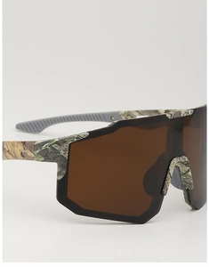 Detailed view of camouflage frame and non-slip rubber tips on cycling sunglasses