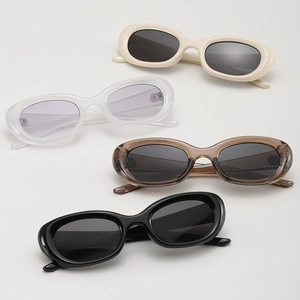 Retro cat-eye sunglasses for women in cream, clear, tea and black oval thick frames