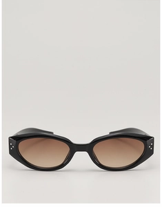 Detail of cat-eye sunglasses featuring three silver metal studs on black glossy frames