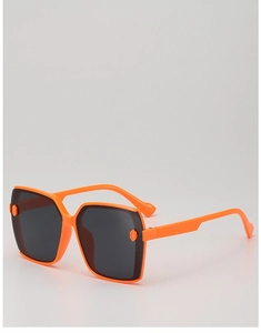 Detail of bright orange square sunglasses with hexagonal accents and embossed temples