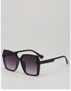 Detail view of children's square sunglasses with textured temples and gradient lenses