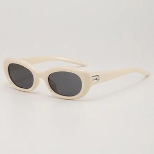Retro cat-eye oval sunglasses in cream white frame with dark grey lenses for UV protection