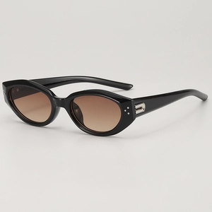 Retro black cat-eye sunglasses with gradient lenses and silver geometric detail