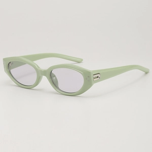 Vintage cat-eye sunglasses with green frame and UV400 lenses shown in side view
