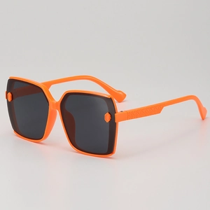 Kids orange square sunglasses with geometric textured temples and UV protection lenses