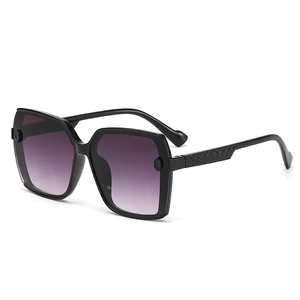 Kids black large frame sunglasses with purple gradient lenses and quilted temple detail