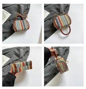 Detail view of woven straw handbag featuring multicolor patterns and rivet leather trim