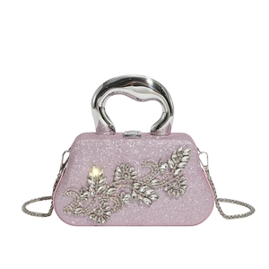 Pink sequined evening shell bag with sparkling diamond flower and silver handle