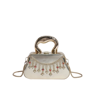 Pochette de soirée dorée luxueuse avec franges en strass et poignée en métal