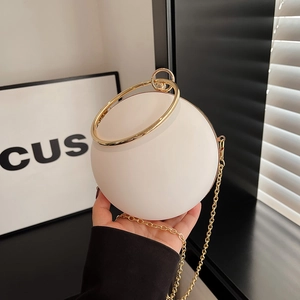 Minimalist white spherical evening bag with gold ring handle and chain strap for women