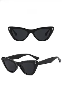 Detailed front and side views of black cat eye sunglasses with silver metal accents