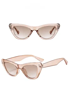 Detailed side view of cat-eye sunglasses with light tea resin frame and metal hinges