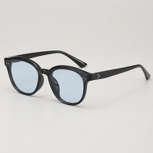 Black frame sunglasses with light blue lenses shown at a 45-degree side angle