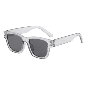 Retro square transparent gray sunglasses with gold metal accents and dark gray lenses