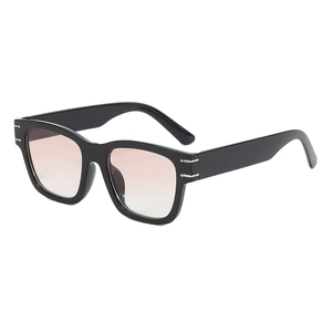 Modern black square sunglasses with gradient lenses and gold metal hinge accents