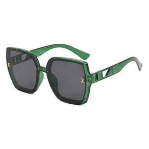 Oversized dark green sunglasses for women with hollow geometric gold metal temples