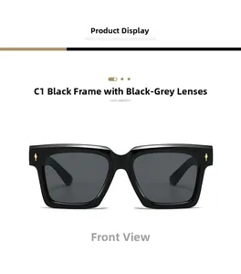 Front view of black square sunglasses with dark gray lenses and gold diamond accents