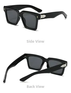 Detail view of square black sunglasses with silver hinges and size code engraving