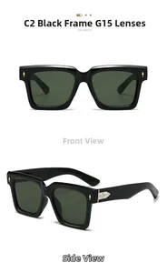 Detail view of square black sunglasses with G15 green lenses and gold arrow metal accents