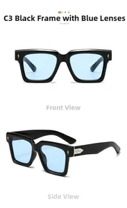 Close-up of vintage square sunglasses with black glossy frames and light blue lenses