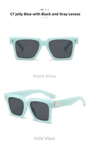Detail view of jelly blue square sunglasses with grey lenses and gold arrow metal hinges