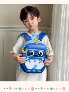 Close-up of blue cartoon robot backpack with 3D eyes and gears for young kids