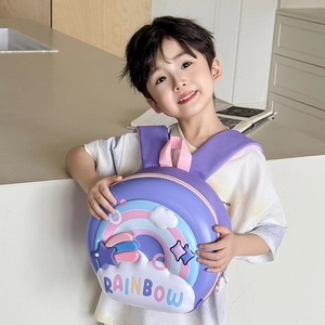 Detail view of purple EVA egg-shaped kids backpack with rainbow design worn by a child