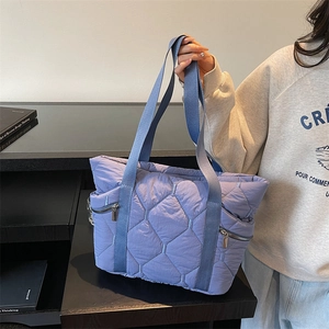 Lavender quilted tote bag with large capacity and contrasting navy nylon straps