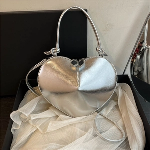 Glossy silver heart-shaped crossbody handbag for women with metallic leather finish