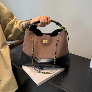 Quilted frosted suede tote bag with metal twist lock and chain strap in retro brown