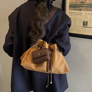 Vintage frosted drawstring cloud bucket bag in ginger yellow with a mini coin purse