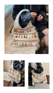Detail of ethnic knit tote bag featuring multi-tone tassels and wavy gold woven ribbon