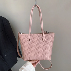 Pink woven leather tote bag with Intrecciato pattern and adjustable shoulder strap