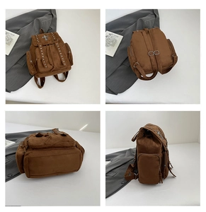 Detailansicht des braunen Wildleder-Rucksacks mit Nieten und Kreuz-Abzeichen aus vier Winkeln