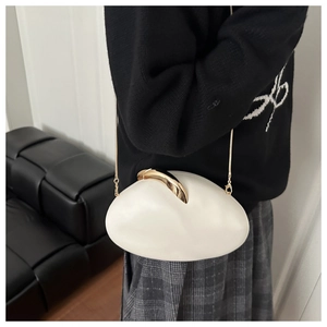 White pebble-shaped PU evening clutch with crescent gold clasp and gold metal chain strap