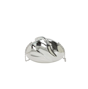 Close-up of a silver mirror finish sculptural evening bag with metal chain strap