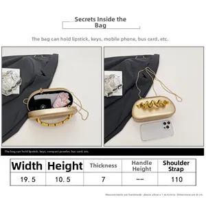 Detailed size chart for golden evening bag showing dimensions 19.5 x 10.5 x 7 cm and strap