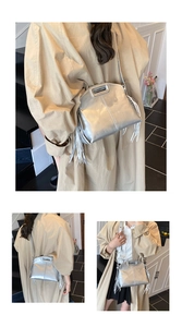 Detail view of metallic silver PU leather tote bag with stylish fringe and top handle