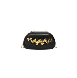 Detailed view of the gold wavy metal handle on the black evening clutch bag