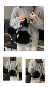 Three-view shot of black plush bucket bag with cute carrot decor and slim strap