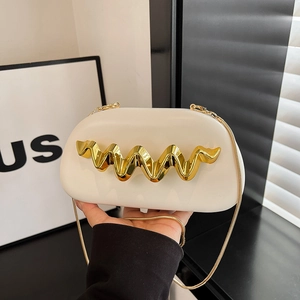 Elegant off-white evening clutch bag with gold wave metal trim and fine chain strap