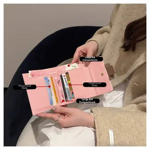 Pink Saffiano wallet interior with three card slots and one large banknote compartment
