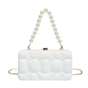 White acrylic evening clutch bag with woven texture and elegant pearl top handle