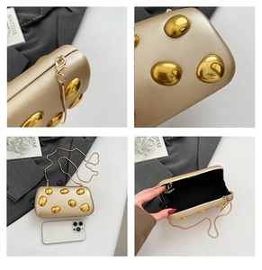 Detailed views of gold clutch with pebble studs and chain strap showing size and interior