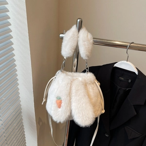 Chic cream faux fur bucket bag with rabbit ear handles and carrot embroidery