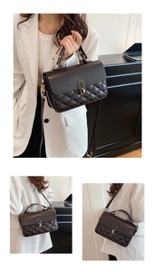 Quilted diamond lattice crossbody bag with gold metallic clasp shown in lifestyle view
