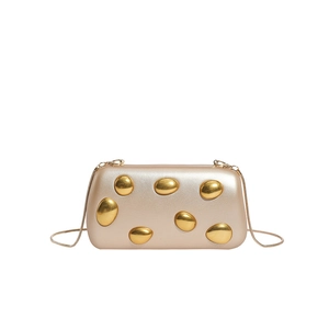 Elegant champagne gold hardshell evening clutch bag with metallic pebble ornaments