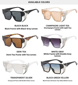 Détail des lunettes de soleil masque oversize avec ornements métalliques aux branches